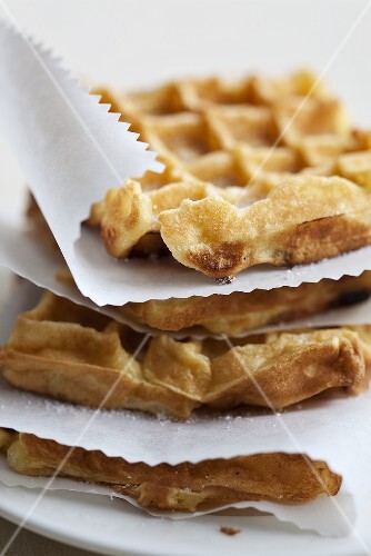 A stack of waffles with cinnamon
