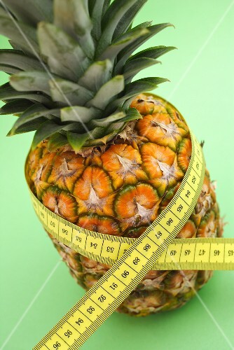 Pineapple with tape measure