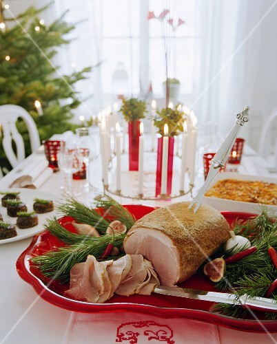 Christmas table with roast ham