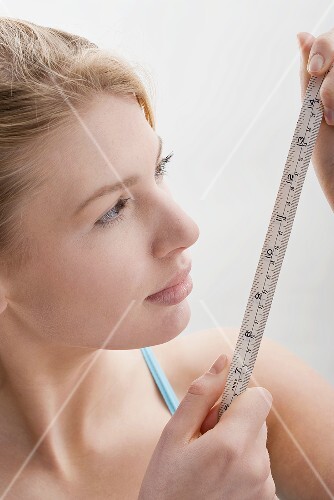 Woman with tape measure