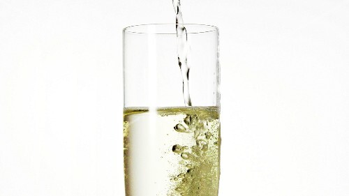Pouring a glass of sparkling wine