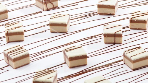 Sweets with chocolate drizzle
