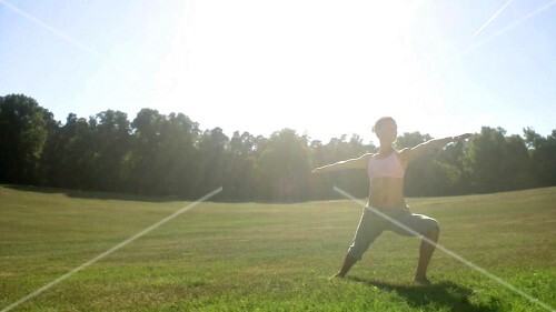 Woman doing yoga exercises in park