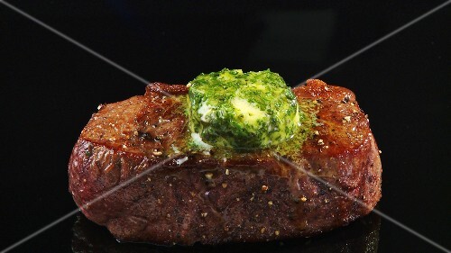 Fried beef sirloin with herb butter