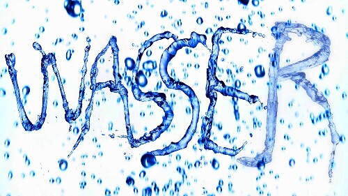 The word 'Wasser' ('water' in German) written in water with splashes