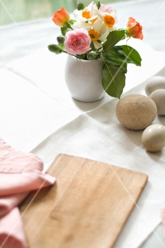 Small Flower Bouquet, Eggs and Table Cloth for Easter Table