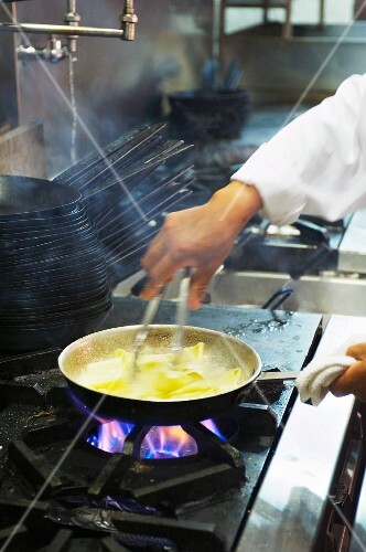 Cooking Pasta in a Skillet on a Gas Stove