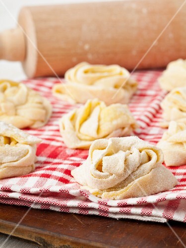Handmade tagliatelle nests made of durum wheat semolina