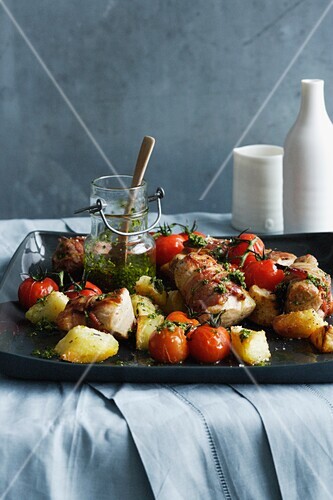 Tray of pork with roasted vegetables