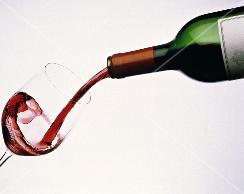 Wine Pouring from Bottle to Glass