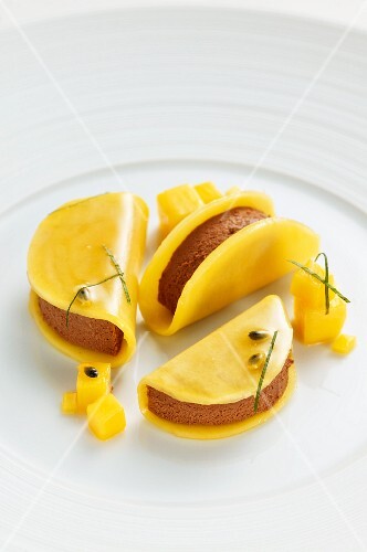 Frozen chocolate with mango and red mint