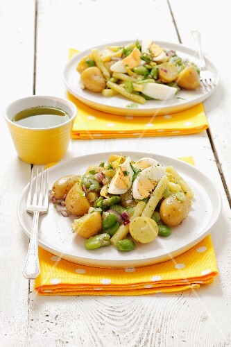 Potato salad with beans, eggs and red onions