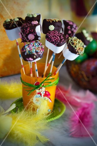 Marshmallow skewers with chocolate and hundreds-and-thousands