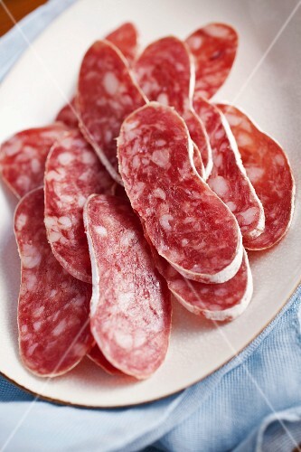 Slices of fuet salami