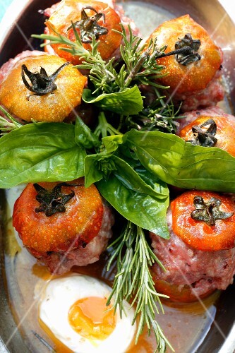 Tomatoes stuffed with minced meat with basil and egg