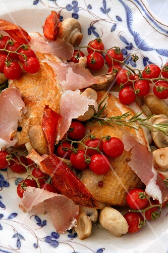 Duck with smoked ham and cherry tomatoes