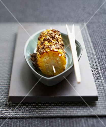 Grilled corn on the cob with an herb crust