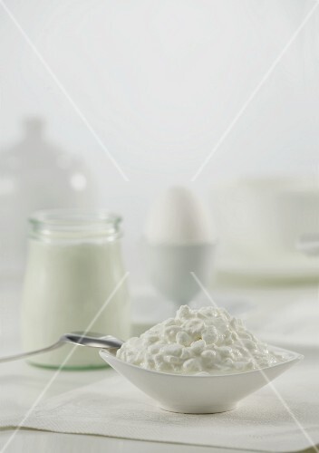 Cottage cheese, jar of yoghurt and a boiled egg