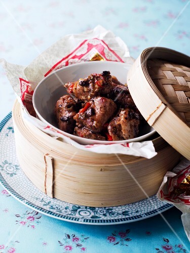 Spare ribs in a bamboo steamer