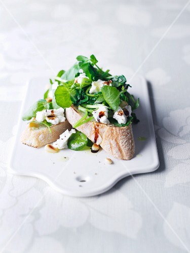 A slice of bread topped with watercress