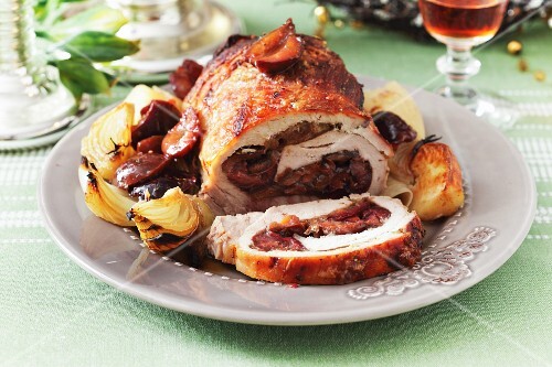 Stuffed roast pork with plums