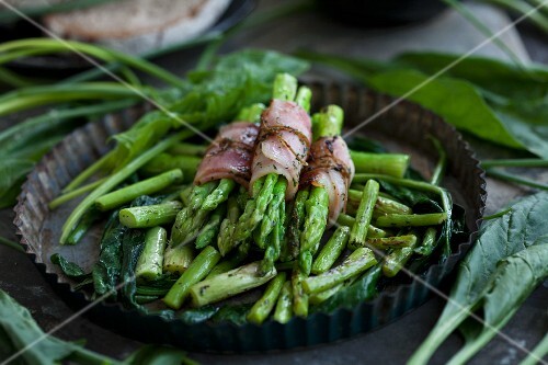 Thai asparagus wrapped in ham with spinach