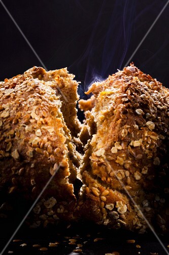 Steaming wholemeal bread, broken in half