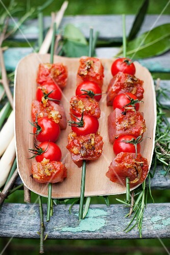 Raw tuna fish kebabs with cherry tomatoes (Morocco) – buy images ...