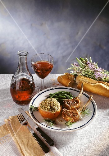 Two lamb chops with stuffed tomato and green beans (1)