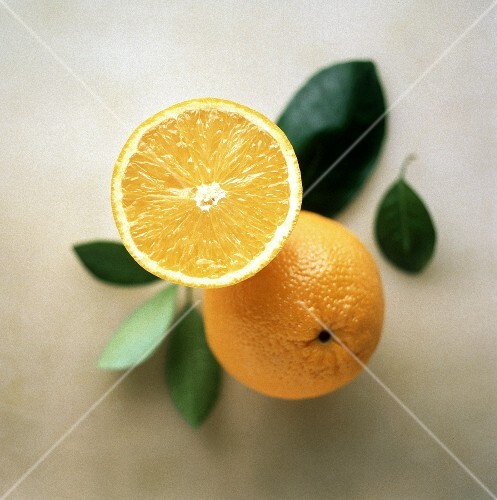 Whole and half orange
