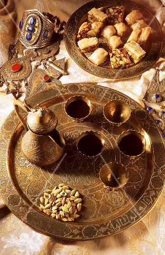 Middle Eastern coffee scene with mocha and pastries (Syria)