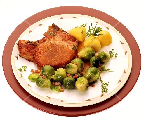 Smoked pork rib with Brussels sprouts, bacon & boiled potatoes