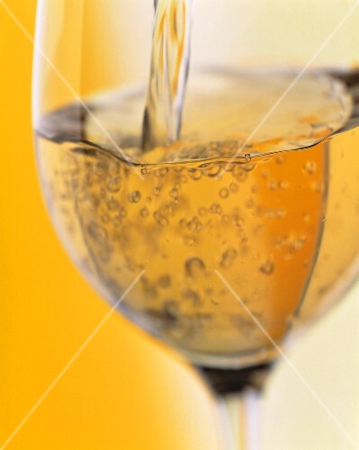 Pouring Prosecco into a Glass