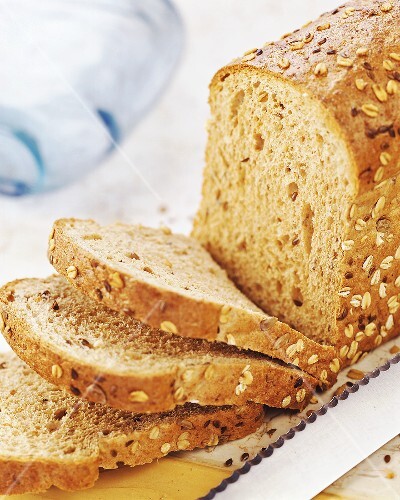 Brown tin loaf, partly sliced
