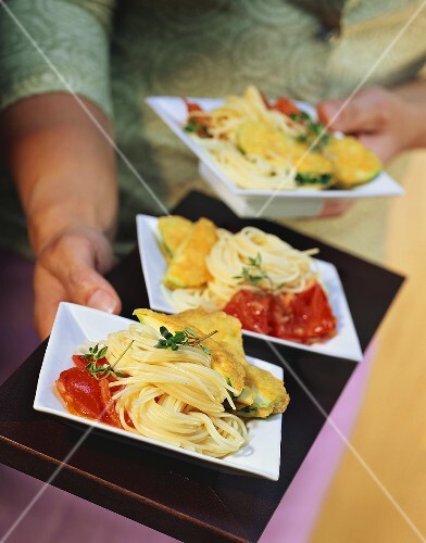 Courgette piccata with spaghetti and tomatoes