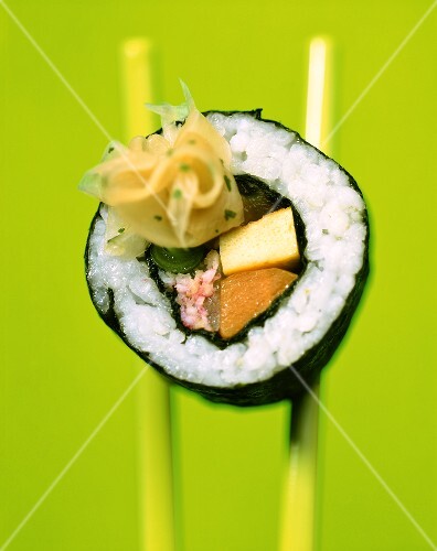 Maki-sushi with crabmeat, scrambled egg and tuna