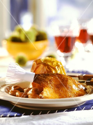 Christmas goose (leg with paper frill), baked apples, chestnuts