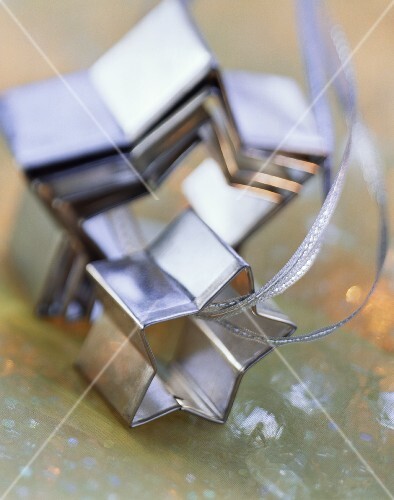 Star-shaped biscuit cutter on silver ribbon