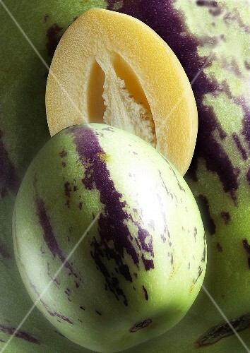 Artistically arranged still life with pepino melon