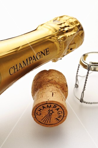 Champagne bottle neck with cork and agraffe