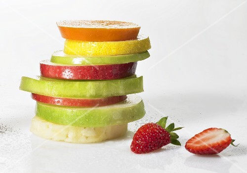 Slices of different fruit, stacked
