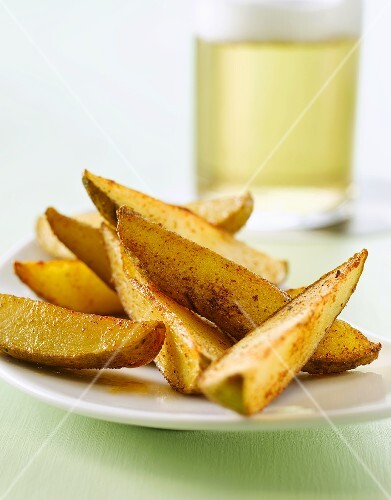 Potato wedges with a glass of beer