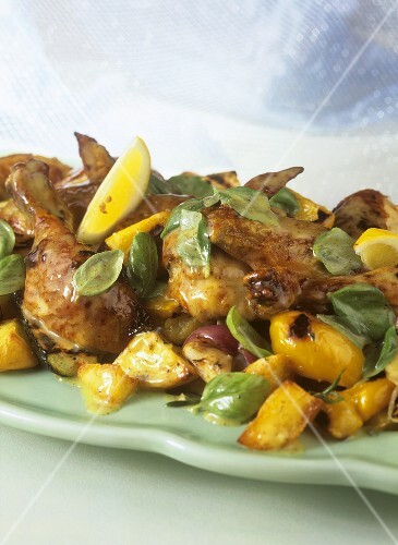 Roast chicken with rosemary potatoes, vegetables, basil