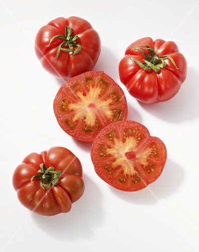 Oxheart tomatoes, whole and halved