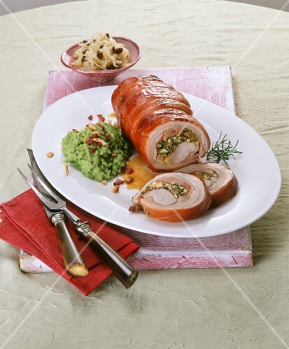 Cochon de lait roulade with mushy peas