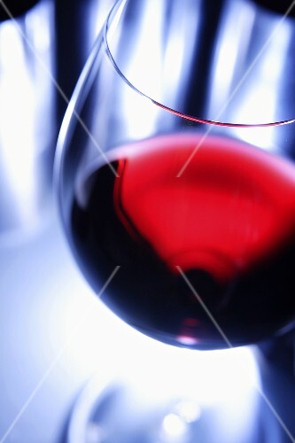A glass of red wine, close-up