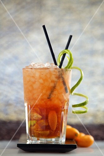 Tatanka (cocktail made with limes, kumquats, vodka, Campari,soda water and cane sugar)