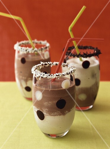 Chocolate and vanilla milk with straws