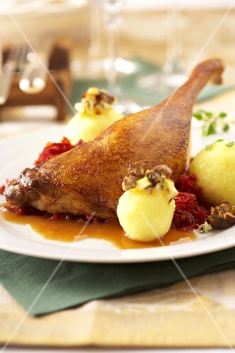 Roast goose leg with potato dumplings