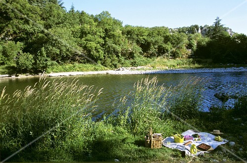 Picnic on a cloth by a lake
